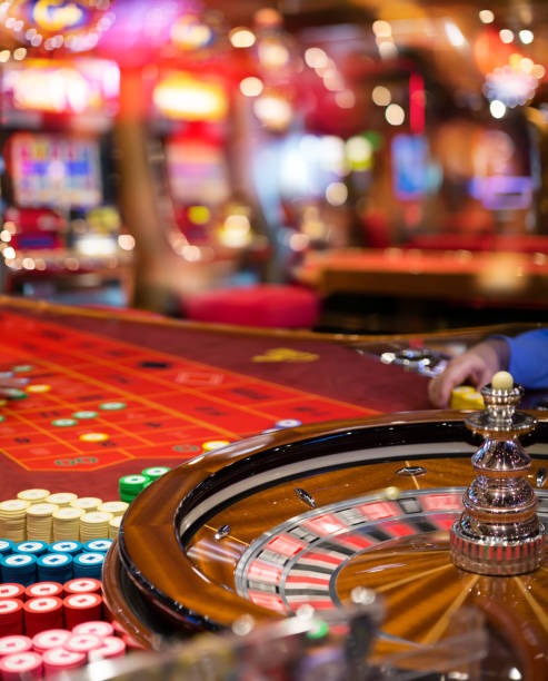 Caishen Wins slot game interface on mobile device showing five-reel layout and bonus symbols